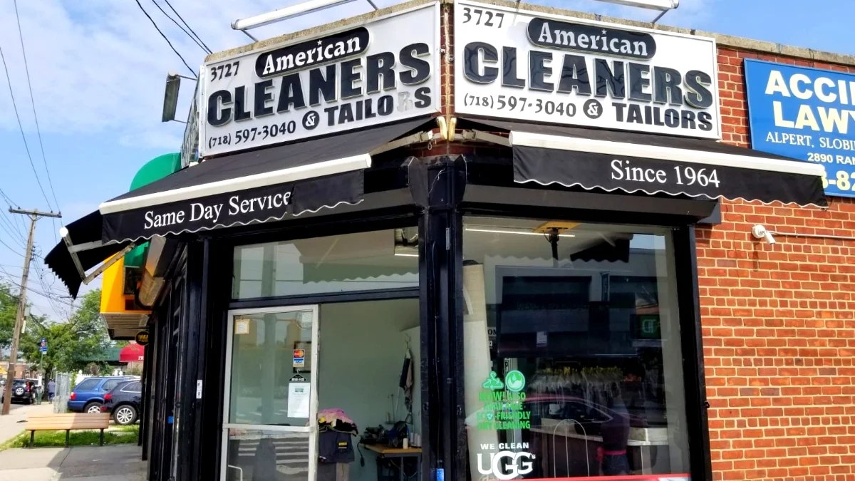 American Cleaners & Tailors, a dry cleaner and tailor at 3727 East Tremont Avenue in Throggs Neck, Bronx, with awnings reading Same Day Service and Since 1964